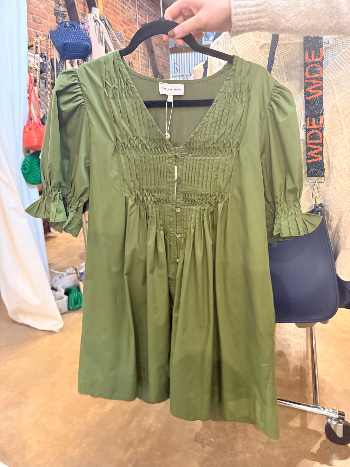 Green pleated mini dress
