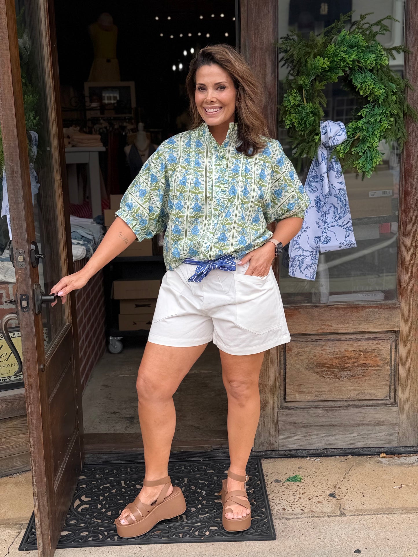 White Shorts with Blue Sash