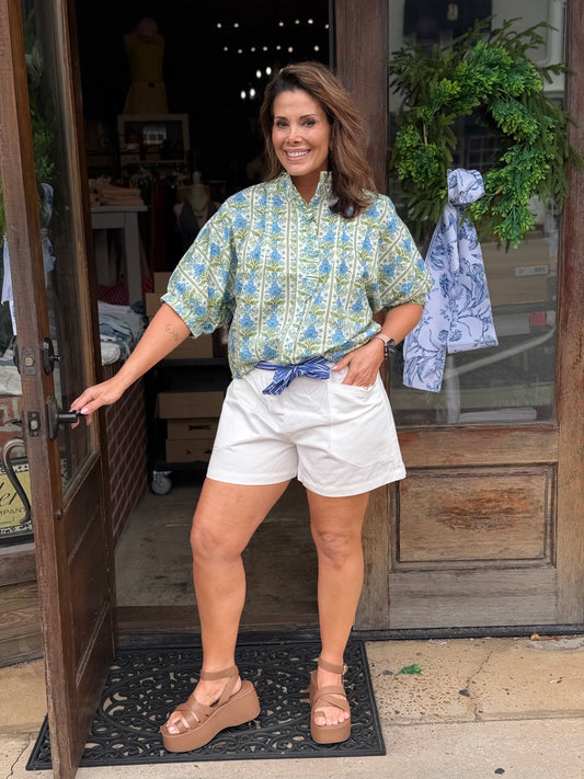 White Shorts with Blue Sash