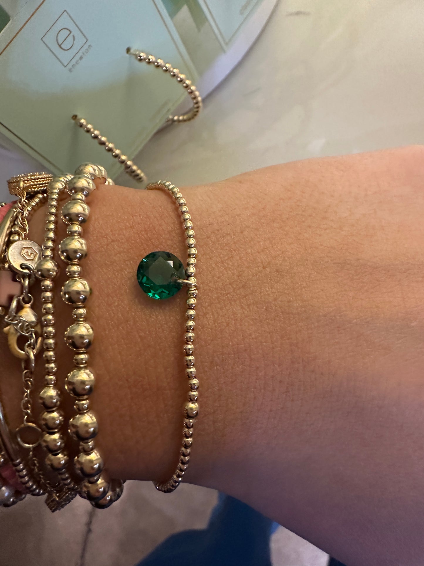 CL GLD 2MM REFL SM BirthStone