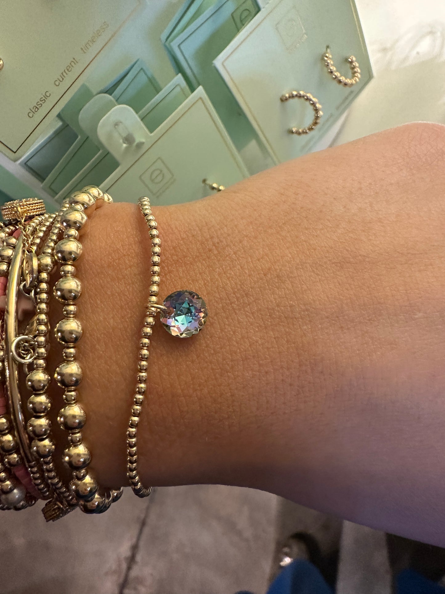 CL GLD 2MM REFL SM BirthStone