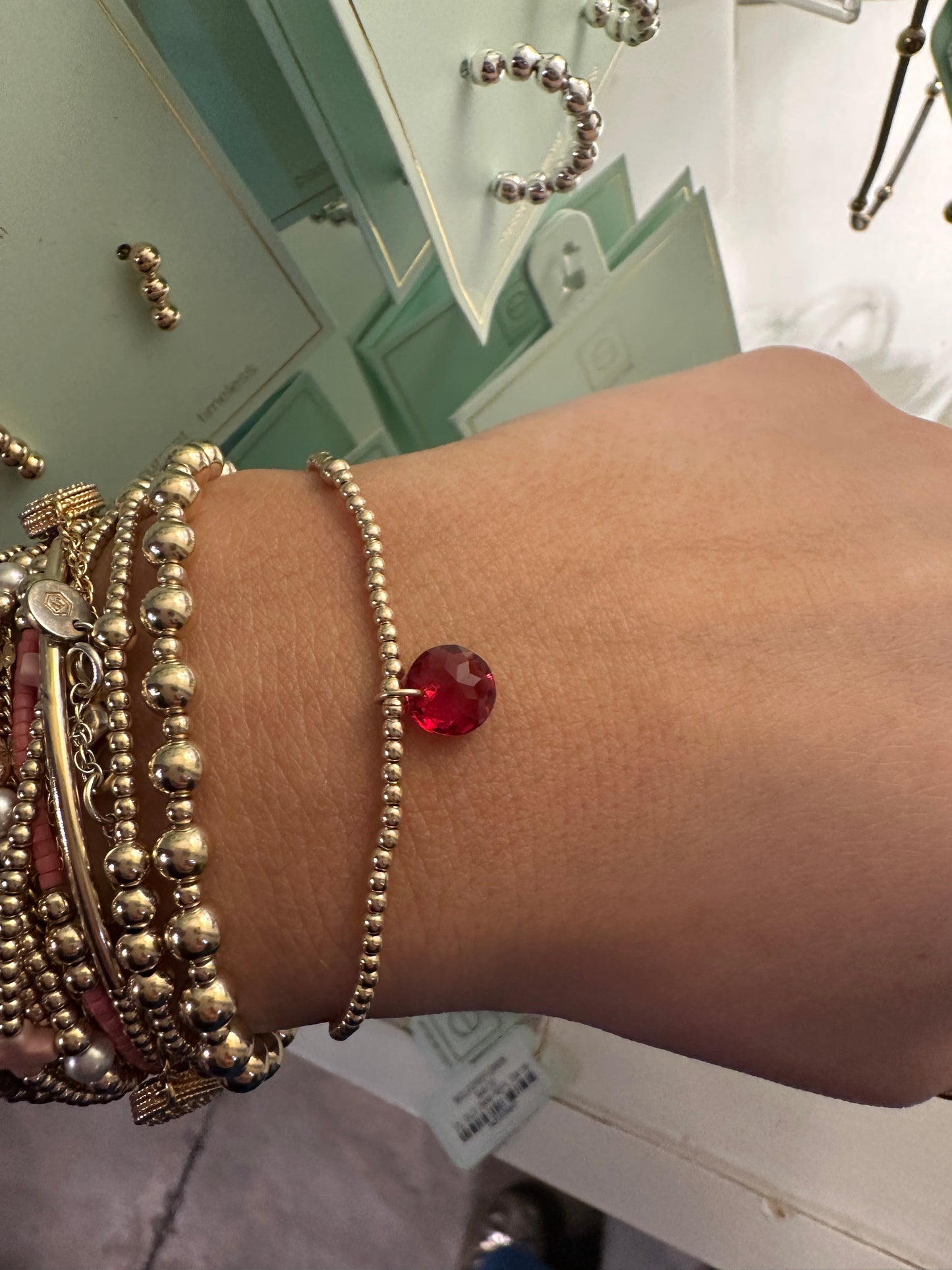 CL GLD 2MM REFL SM BirthStone