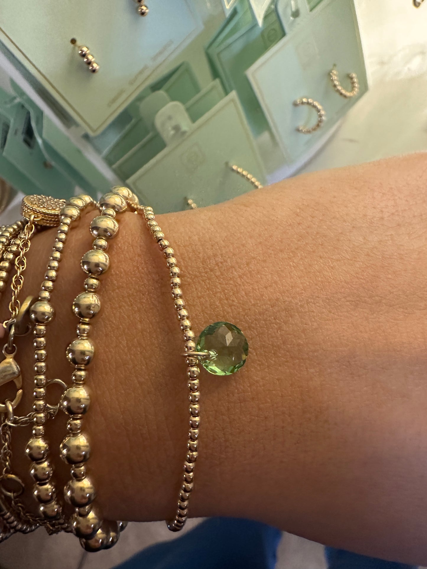 CL GLD 2MM REFL SM BirthStone