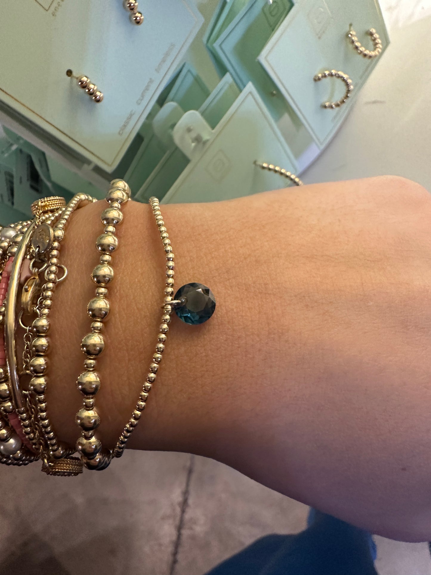 CL GLD 2MM REFL SM BirthStone