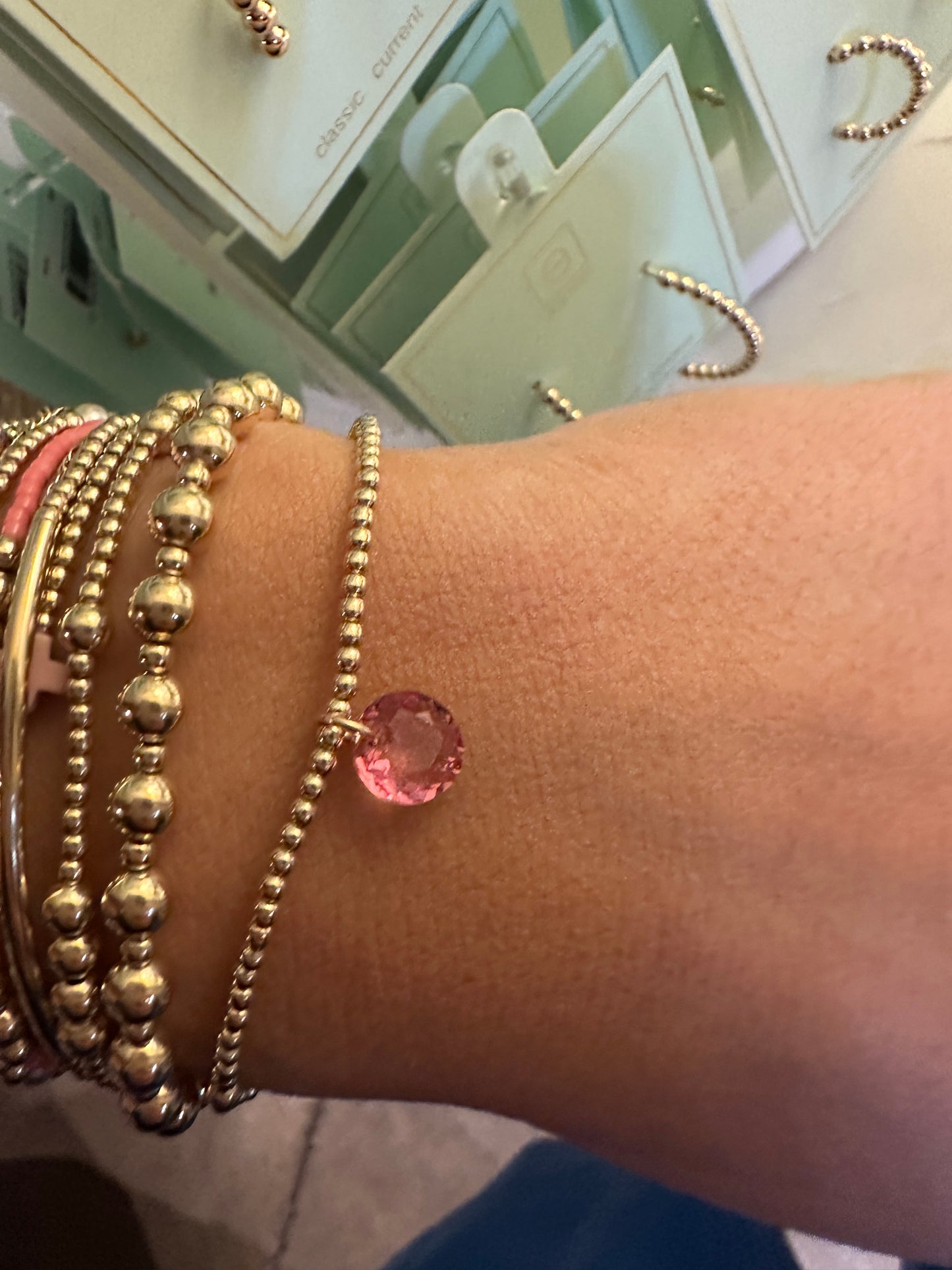 CL GLD 2MM REFL SM BirthStone